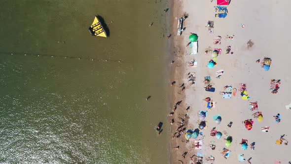 Aerial View of the Beachfront in the Middle of a Hot Summer Day