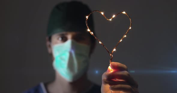 Doctor is Holding an Heart
