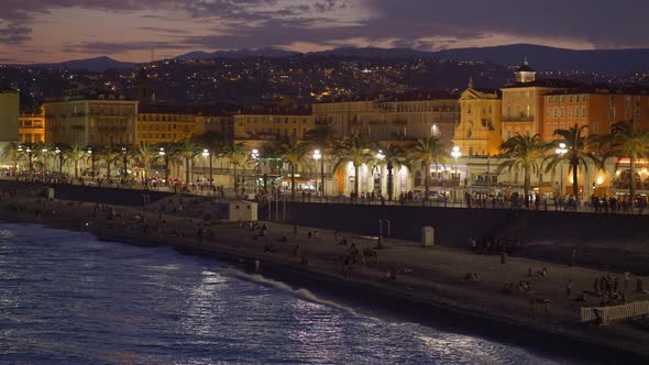 Evening View of the Beach and Embankment of Nice, France, Panning Shot