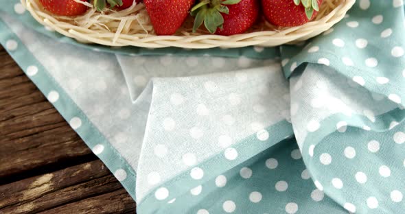 Fresh strawberries in wicker tray