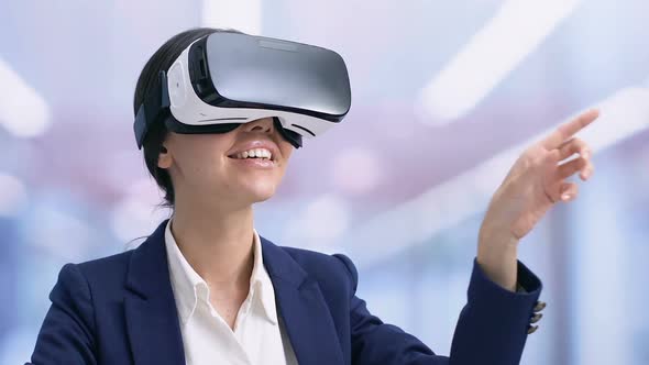 Smiling Businesslady in VR Headset Preparing Presentation, Modern Technologies