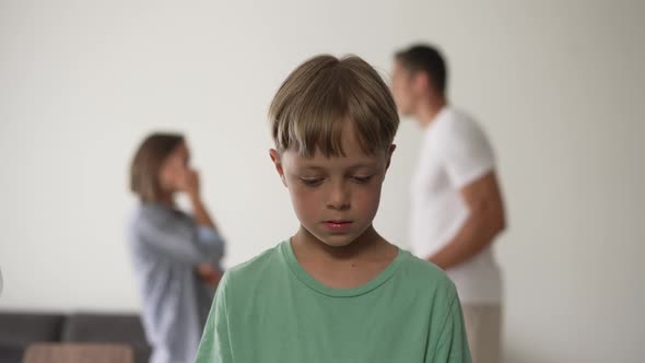 Kid Son Feels Upset While Parents Fighting at Background Sad Little Girl Frustrated with