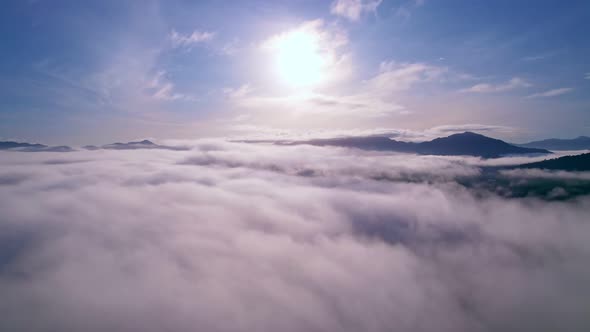 Drone view flying over sea of mist or fog Landscape High angle view