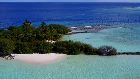 Drone view tourism of seashore beach by blue lagoon and sand background