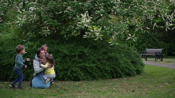 Happy Family Mom Three Little Siblings Kids Have Fun Blowing Bubbles Enjoying Summer Holidays in