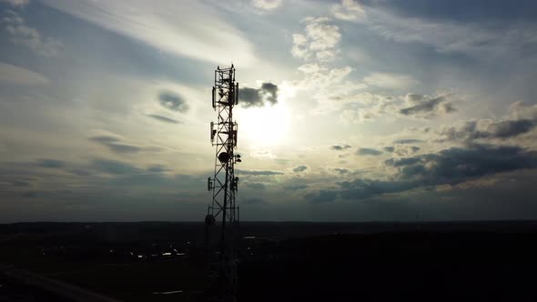 Aerial view of the silhouette of the telecommunications tower