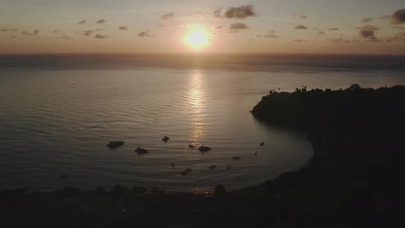 Beautiful Landscape with Ocean Water at Bay Reflecting Morning Sun and Sparkling at Seaside