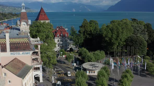Aerial from downtown Lausanne towards beautiful lake Geneva in summer