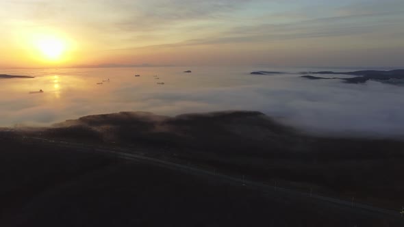 Drone View of the Bay with Ships in the Fog