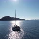 The Catamaran Yacht Sails on the Sea Towards the Island - VideoHive Item for Sale