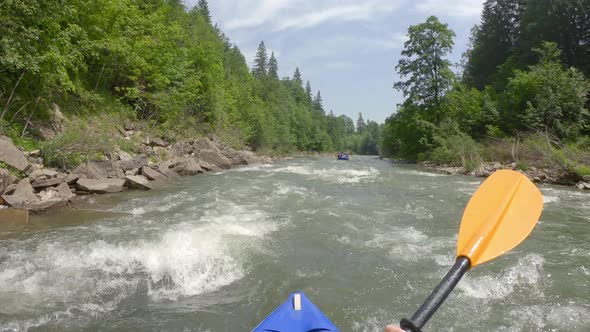 Extreme Rafting in Small Boats on Mountain River