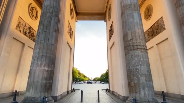 Walk Through Brandenburg Gate in Berlin, Germany with No People at Golden Hour Sunset During