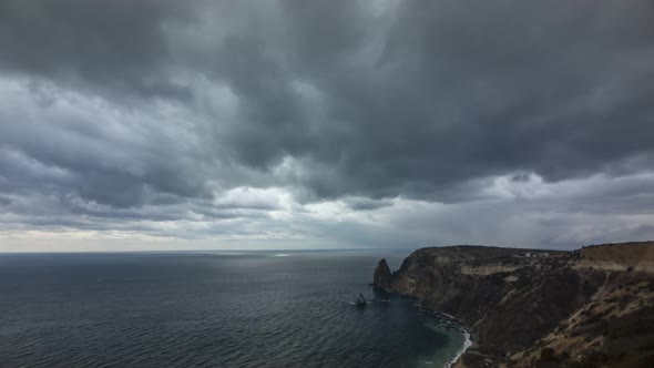 Timelapse on Overcast Day with Rainsnow Cumulonimbus Clouds Moving Through the Sky at Different