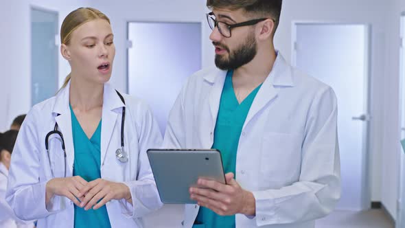 Closeup in Front of Multiethnic Two Doctors Female