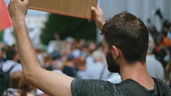 Political Resistance Rally Protester Activist with Poster Banner Placard Sign