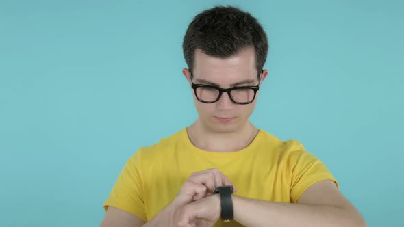Man Browsing Internet, Using Smartwatch