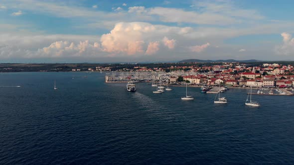 Sailboats in the Mediterranean Sea out of the coast in Zadar Croatia, with copy space.