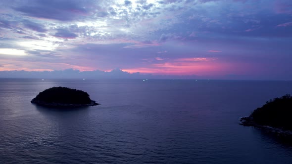 Purple Sunset with a View of the Sea and Clouds