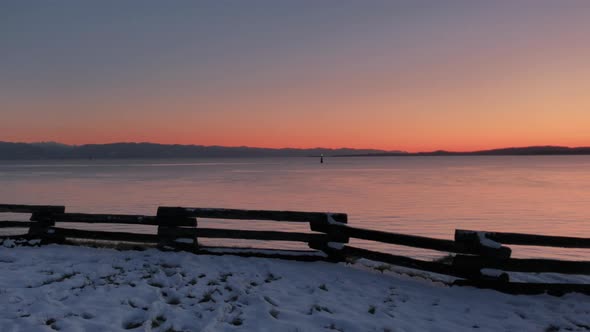 Winter Ocean shore in warm twilight