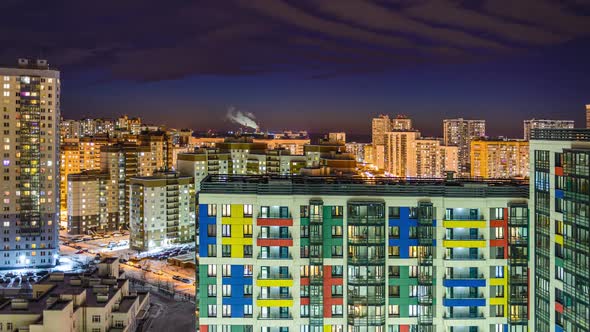 residential buildings in the night city, apartments and apartments. timelapse of the night city