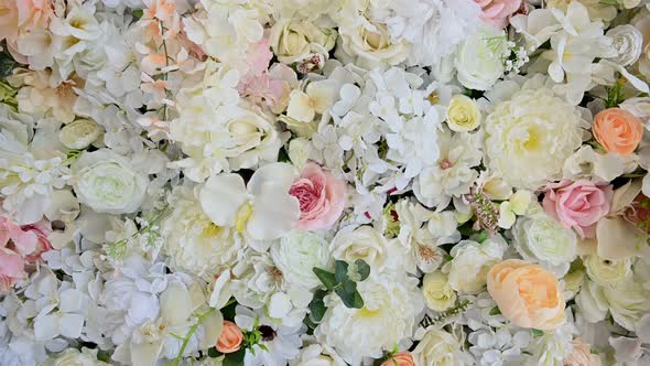 Decorative Wall Made of Bright Flowers of Different Types