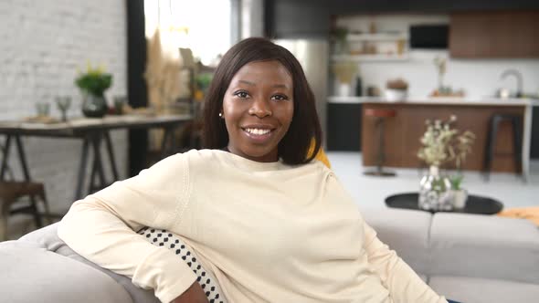 Charming AfricanAmerican Woman Rest at Home