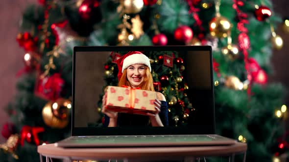 Woman Congratulates Relatives Christmas Via Laptop Online View From Web Camera