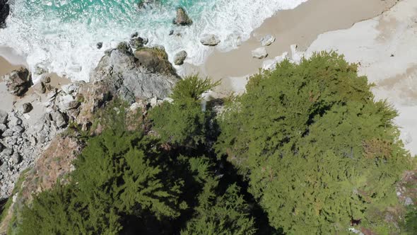 Top Down View Cinematic Waterfall Aerial Landscape Water Fall and Lagoon Beach