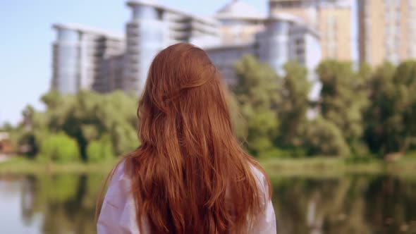 Portrait Young Woman with Amazing Red Long Hair