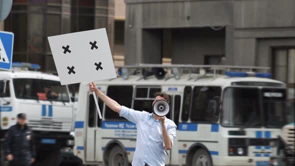 Angry Man at Picket Rally. Agressive Anger Hooligan. Aggressive Police. Lawlessness Aggression Cops.