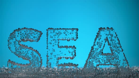 Word Sea Underwater in Oxygen Bubbles on Blue Background