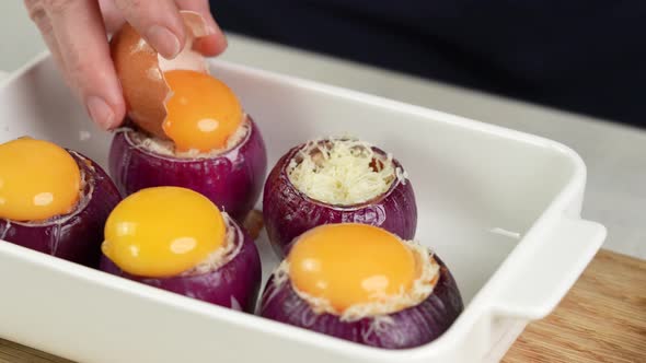 the Cook Puts a Raw Egg on an Onion Stuffed with Minced Meat and Vegetables