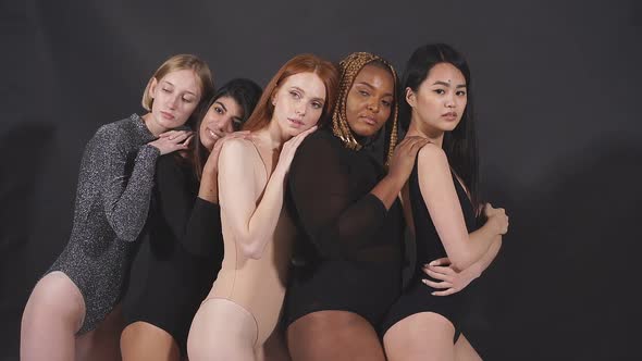 Beautiful Multiethnic Group of Models Posing at Camera