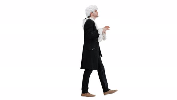 Man Dressed Like Mozart Conducting While Walking on White Background