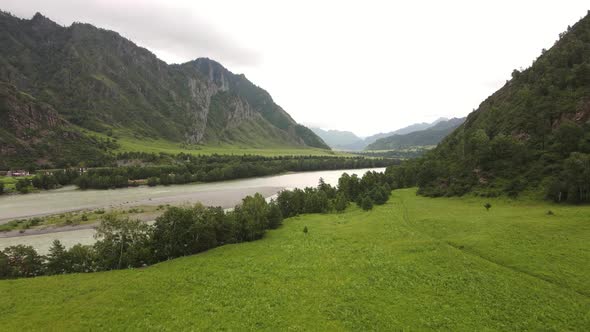 A Mountain River in a Green Valley