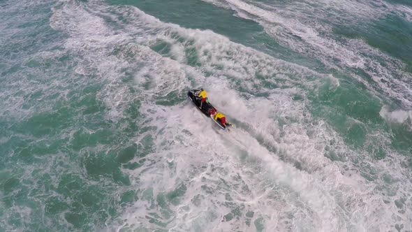 Aerial view of lifeguard surf rescue jet ski personal watercraft in Hawaii