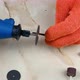 Cutting metal with a dremel emery disc. - VideoHive Item for Sale