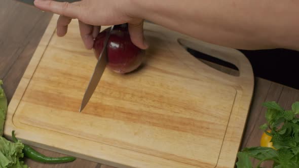 Professional Chef Cuts Red Onion