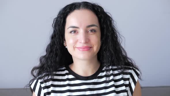 Portrait Beautiful Mixed Race Woman Smiling 30's Looking Up at Camera with Happy Emotion Enjoying