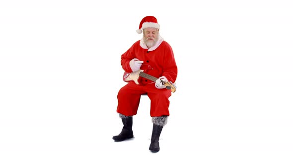 Santa claus singing a song and playing guitar 4k