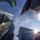 Timelapse of the sun passing between office buildings - VideoHive Item for Sale