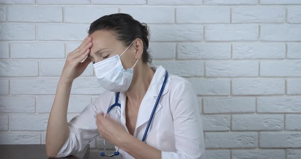 Woman Physician in Mask