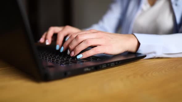 Slow motion Unrecognizable Businesswoman female hands using typing on laptop