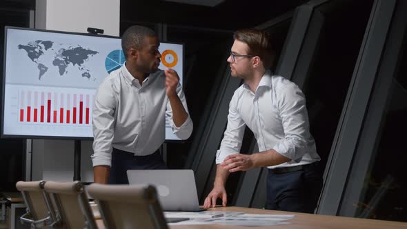 Startup business: young businessmen working in office