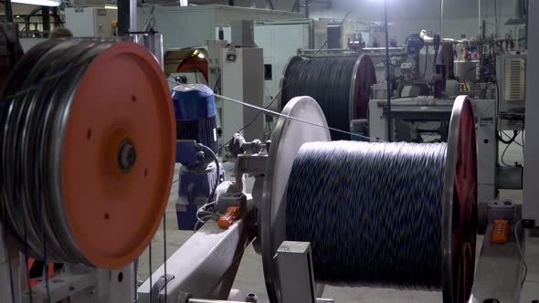 an Electrical Cable in Isolation Is Wound on a Metal Coil