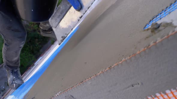 Industrial Climber Using Trowel Putty Glue on Fiberglass Mesh To Insulate Facade