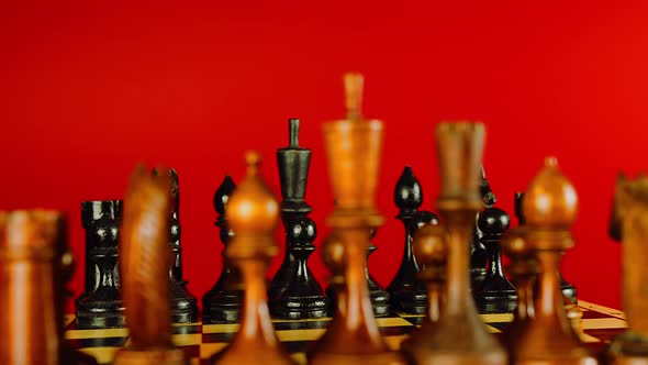 Close Up of Black Chess Pieces on Board