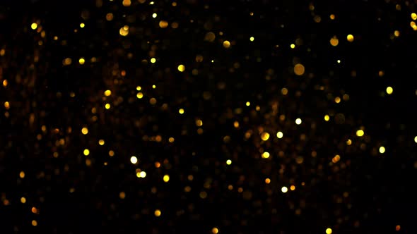 Super Slow Motion Shot of Golden Glitter Background at 1000Fps