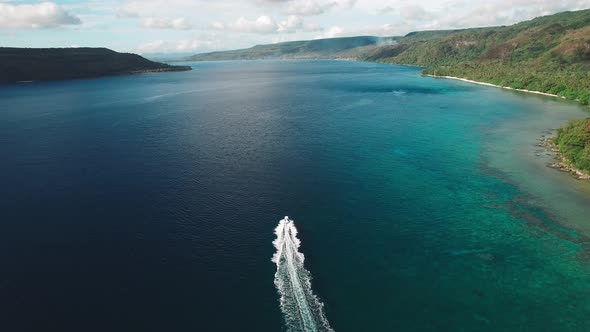 Speedboat Sailing in Gulf of Tropical Sea, Aerial View on Scenic Coastline With Untouched Nature