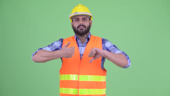 Confused Overweight Bearded Indian Man Construction Worker Making Decisions